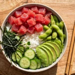 are poke bowls healthy — a poke bowl with tuna, rice, edamame, cucumber and avocado